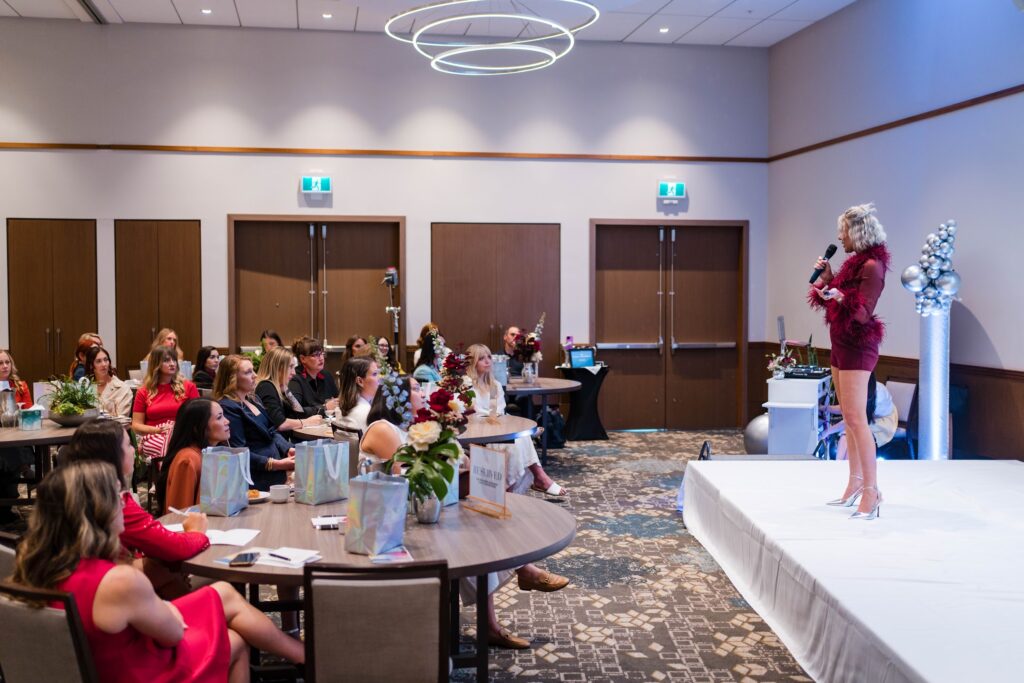 Personal Brand speaker Katrina Owens delivers her motivational keynote speech to a large audience